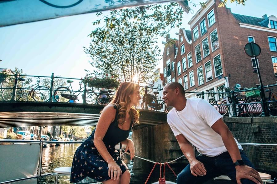 Enjoy a romantic canal tour in Amsterdam