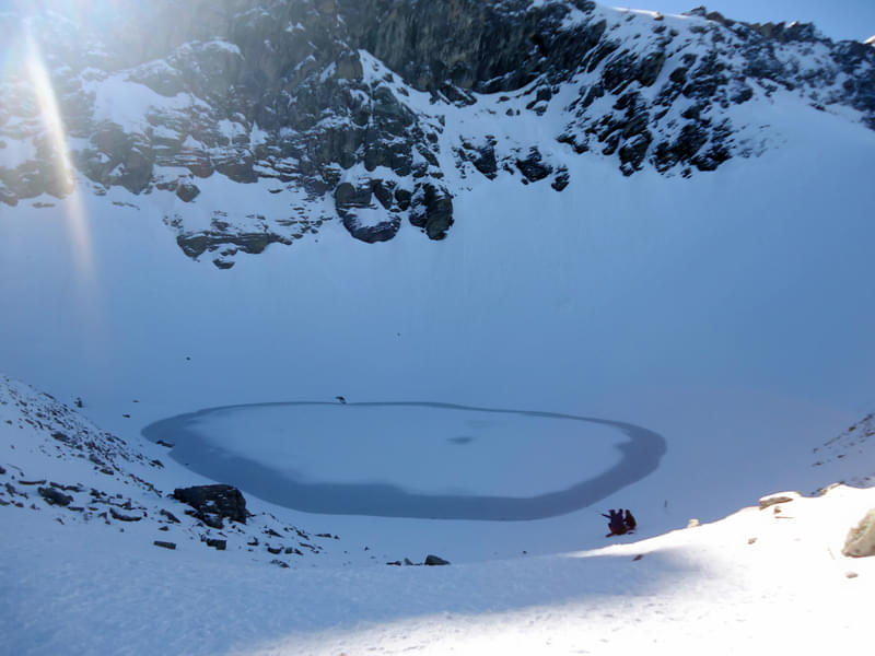 Be amazed by the scenic views of frozen Roopkund Lake