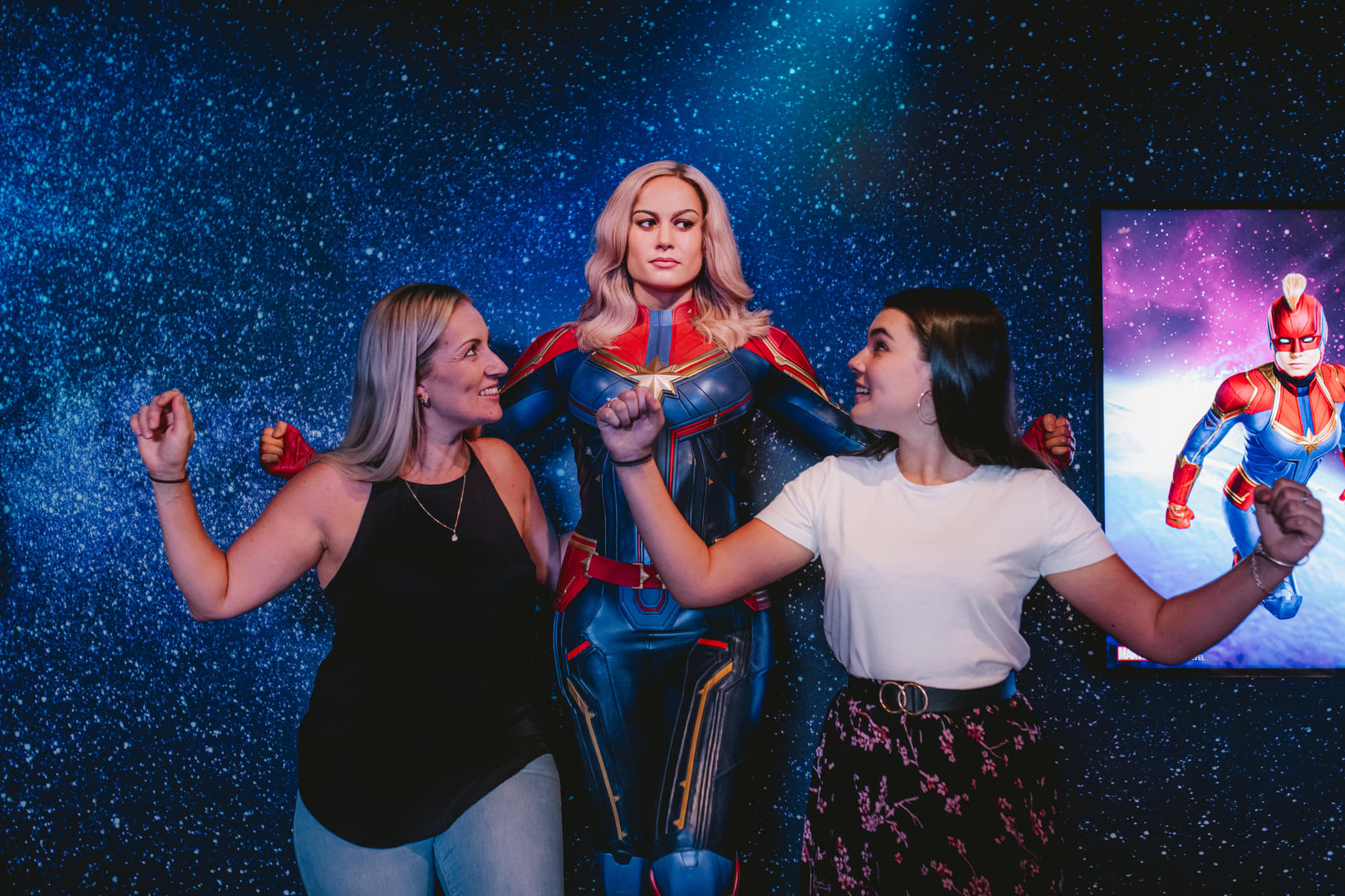 Pose for a powerful pictures next to Captain Marvel