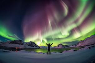 Tourist witnessing Northern Lights