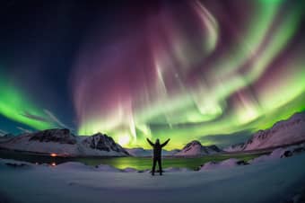 Tourist witnessing Northern Lights