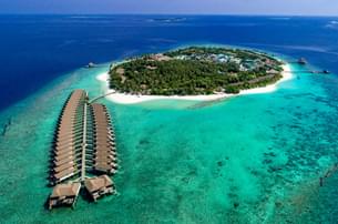 Marvel at the aerial view of Reethi Faru Resort, offering a luxurious escape