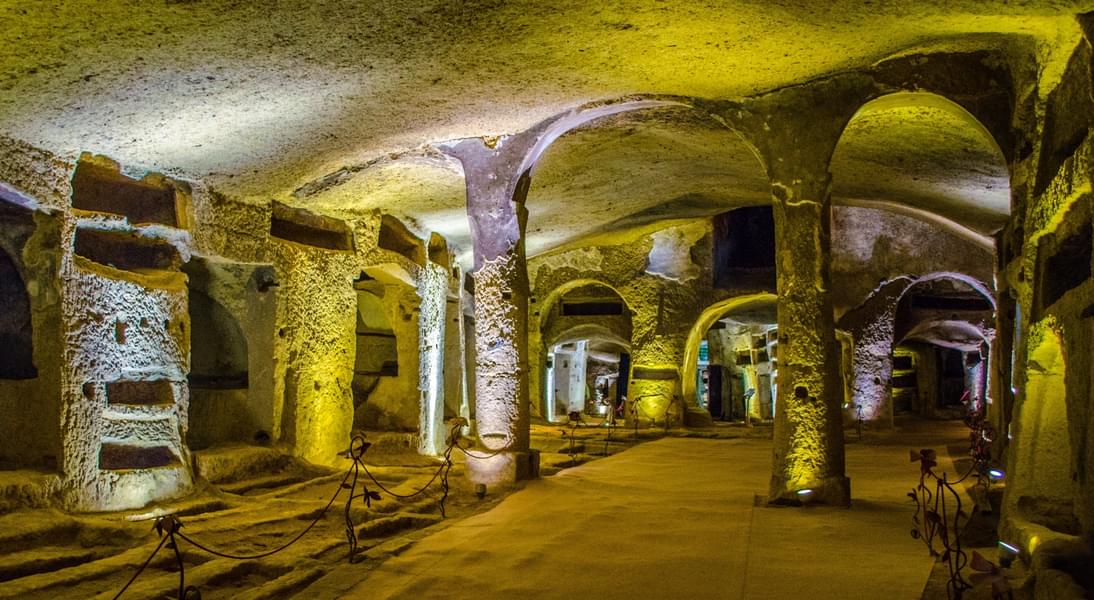 Wander through the enigmatic Catacombs of San Gennaro, built in the second century AD