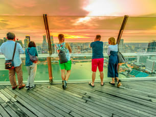 Visit the observation deck of Marina Bay and witness a lovely sunset