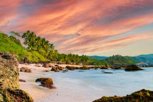 Soak in breathtaking views of Varkala Beach from its iconic cliffs