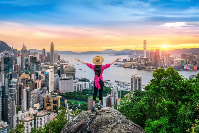 Tourist standing on viewpoint in Hong Kong
