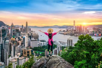 Tourist standing on viewpoint in Hong Kong