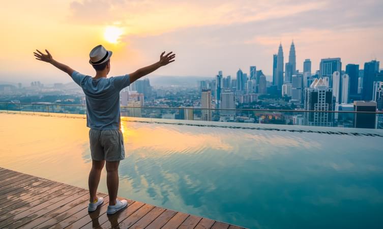 Tourist admiring the skyline of Kuala Lumpur