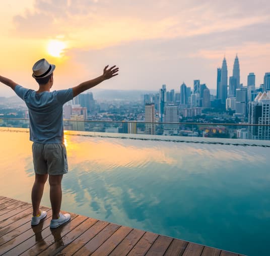Tourist admiring the skyline of Kuala Lumpur