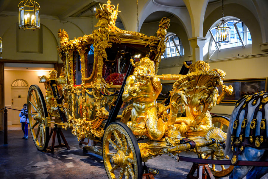 See royal artefacts like the historical carriages at the Royal Mews