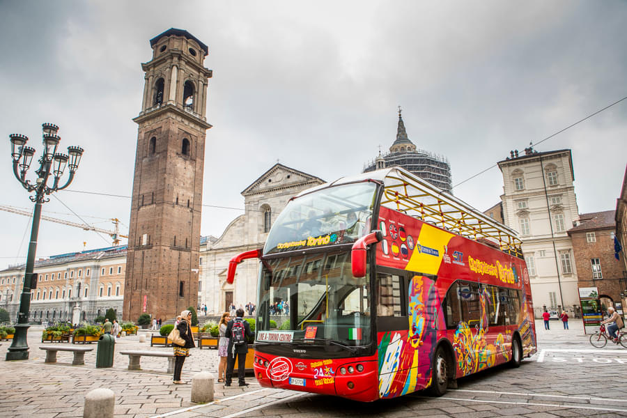 Embark on the hop-on-hop-off bus to explore Turin's Mole Antonelliana