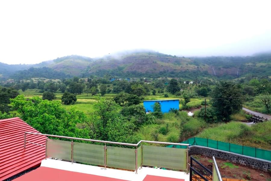 A Villa Retreat Amidst Lush Green Hills In Pawna Image
