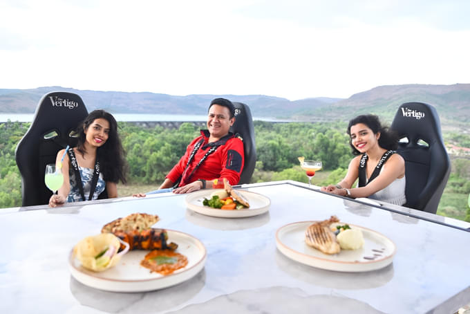 Indulge in gourmet meals prepared by expert chefs in the sky