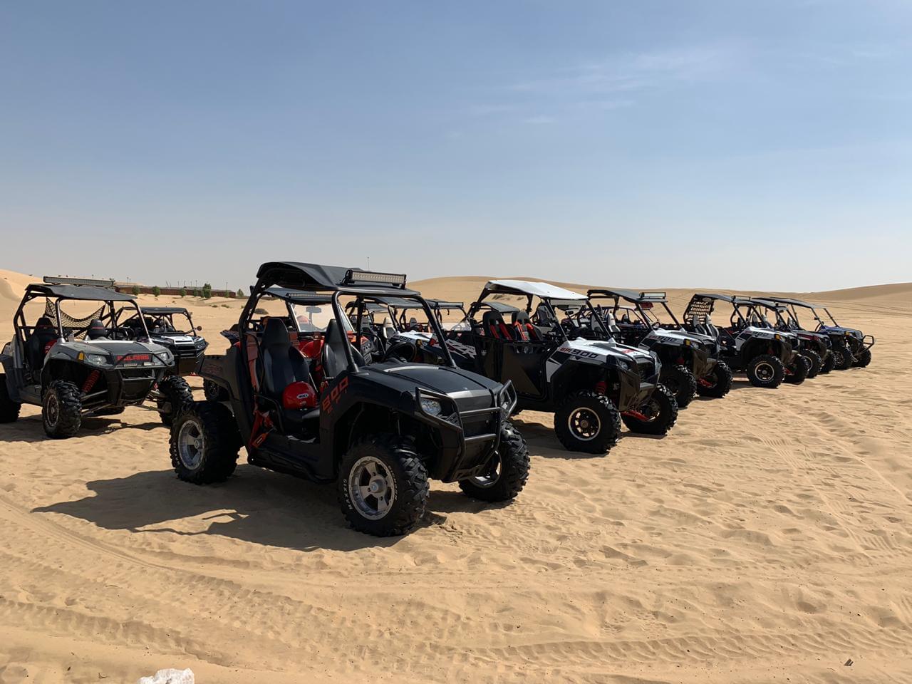 Dune Buggies parked at the desert.