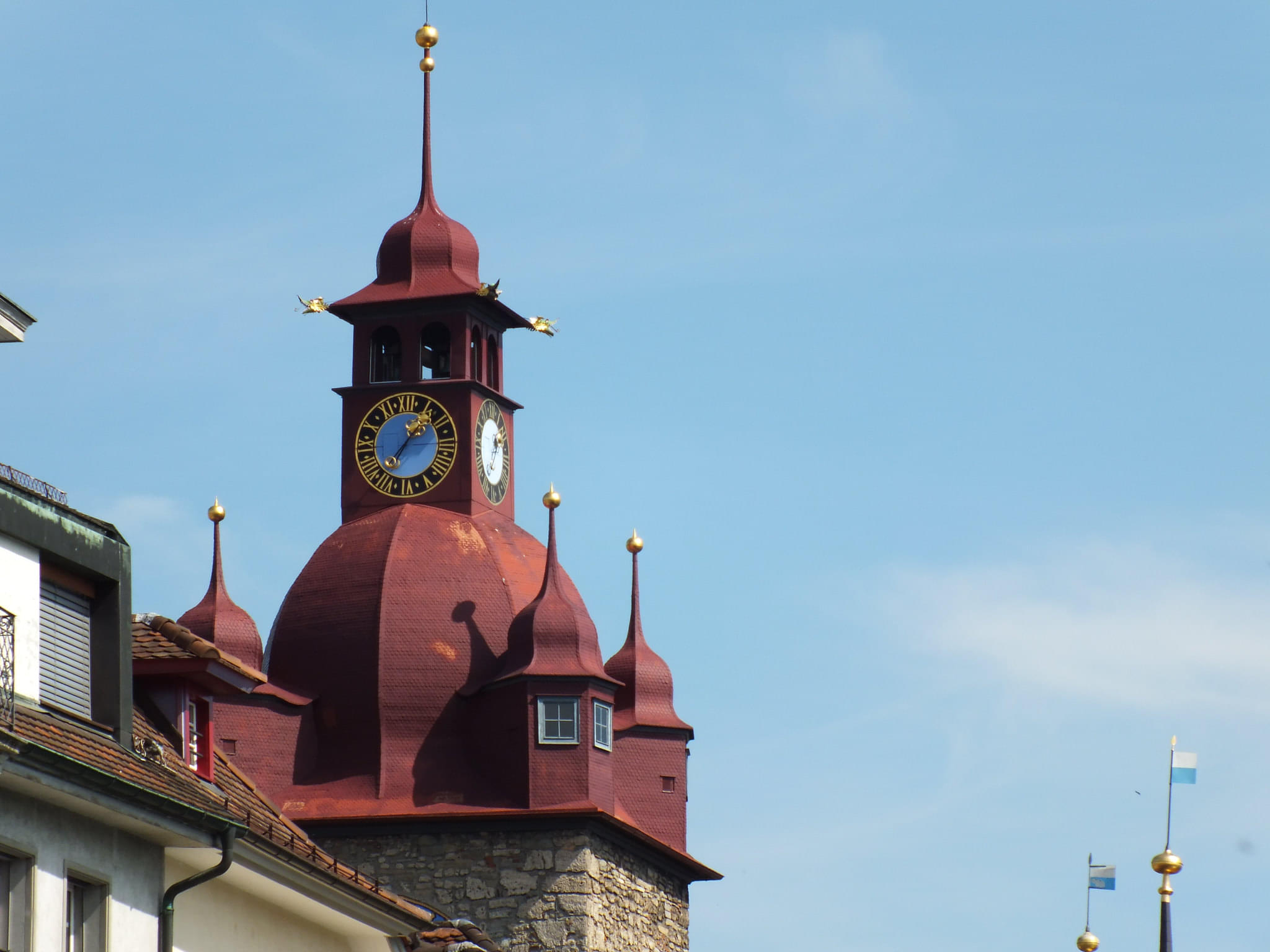 Walk Along the Chapel Bridge & Visit the Clock Tower