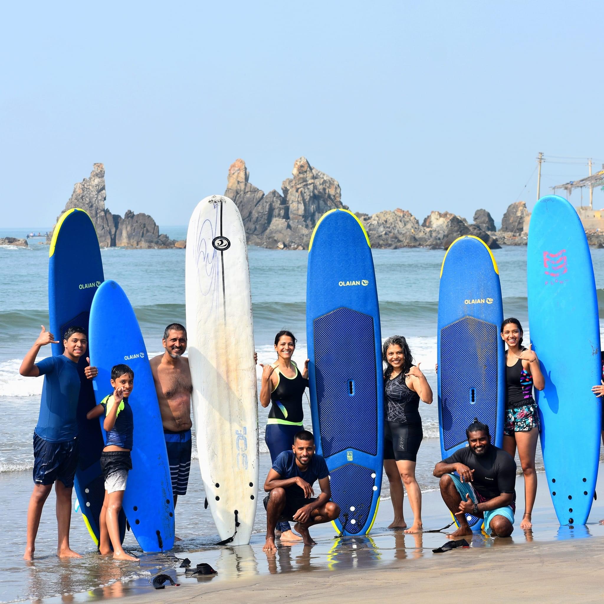 Embark on adventurous surfing at Arambol Beach with your folks