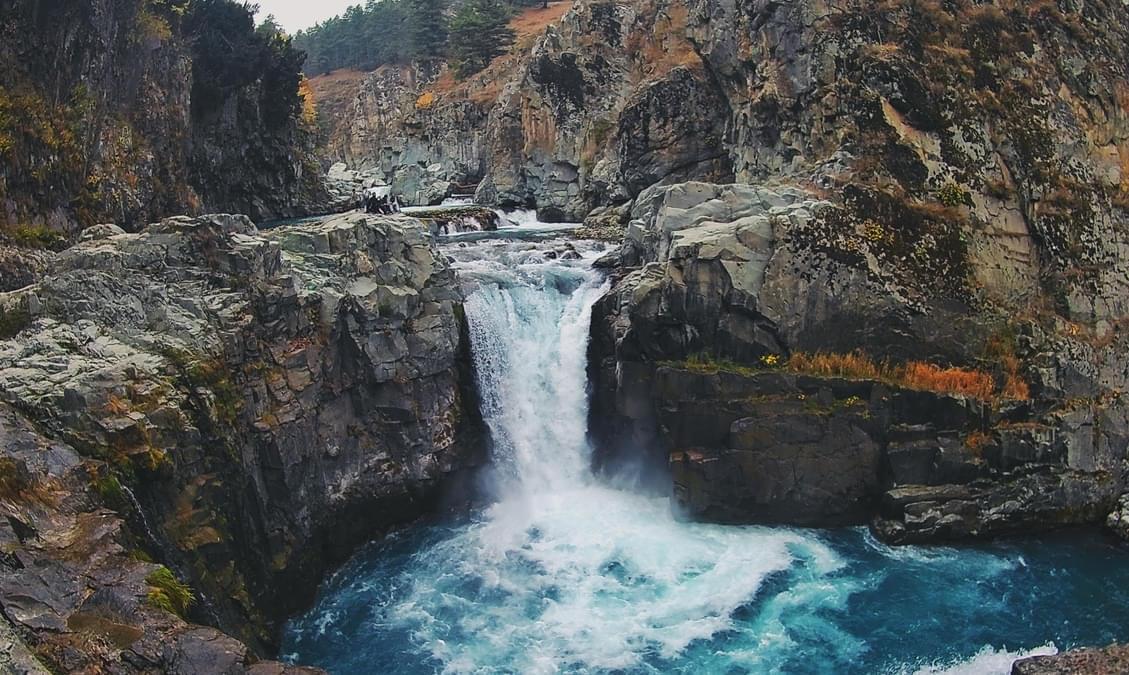Witness the Aharbal Waterfall