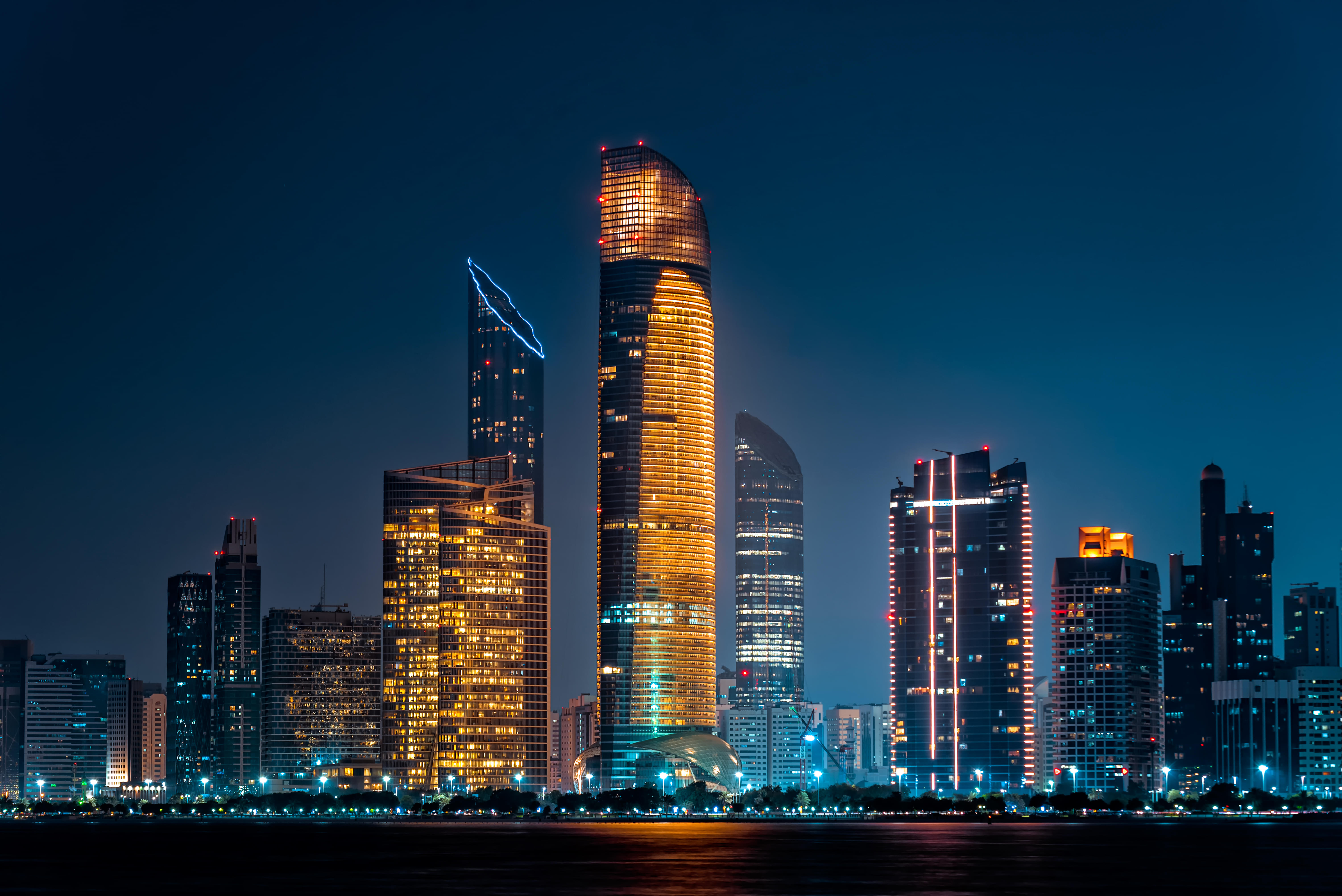 abu dhabi skyscapers in night