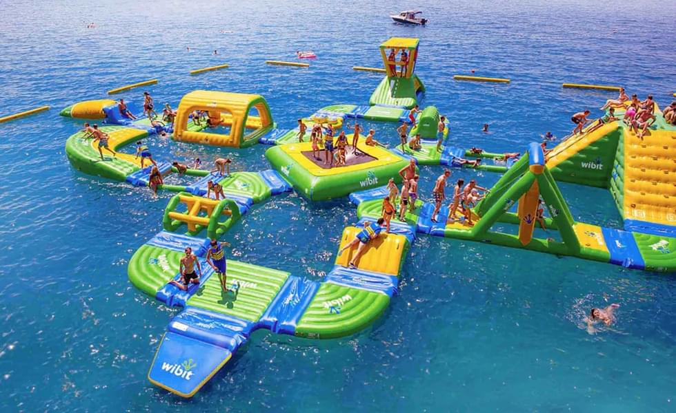 Enjoy an exhilarating time with your family and friends at this floating aqua park!