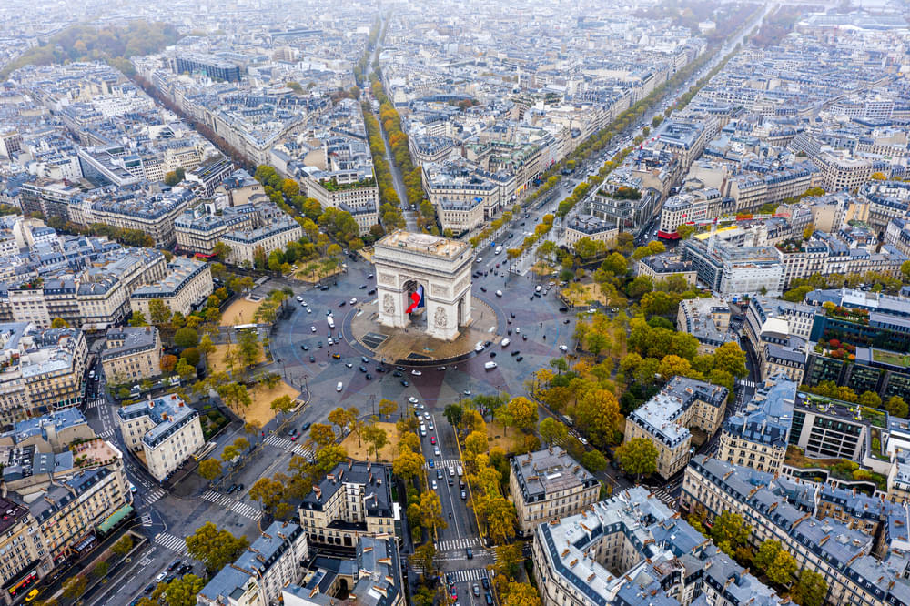 Feel the pulse of Parisian energy on the bustling Champs-Élysées