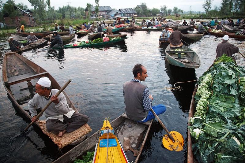 Admire local culture at the floating gardens