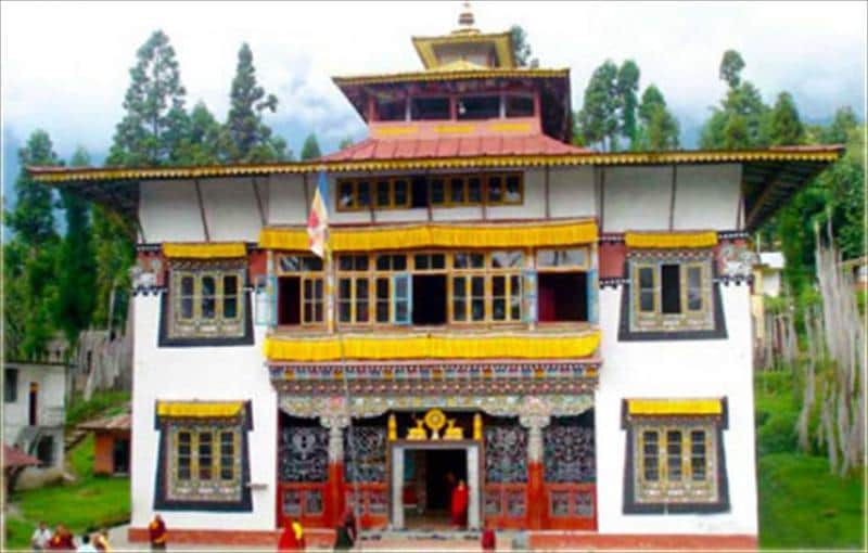 Stroll through prayer wheel-lined courtyards