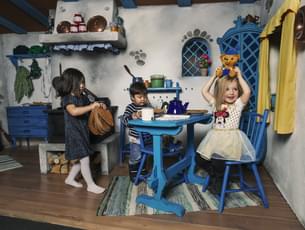 Watch your kids have fun in the life size doll house kitchen
