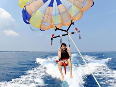 Feel the adrenaline rush as you parasail over Dubai's Waterfront
