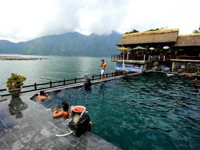 Relax and rejuvenate in the natural hot springs of Bali, a true oasis of tranquility