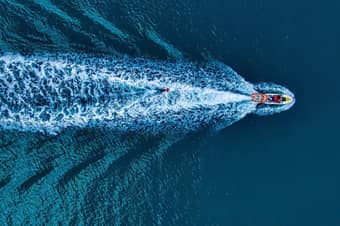 Feel the thrill of the waves as you zoom across Ghoghla Beach