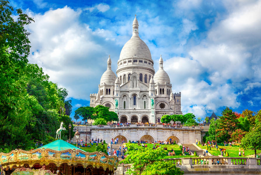 Marvel at the architecture of the Basilica of the Sacred Heart of Paris