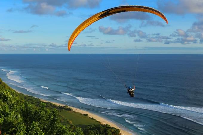 Person Paragliding in Uluwatu