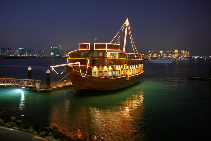 View Abu Dhabi from the water on a scenic dinner cruise 