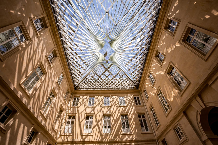 Marvel at the pyramid shaped Glass Roof of the hotel