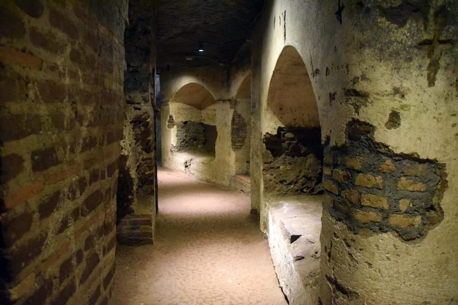 Adorn the walls and ceilings of the Catacombs of Priscilla which offers a glimpse into early Christian art and burial practices