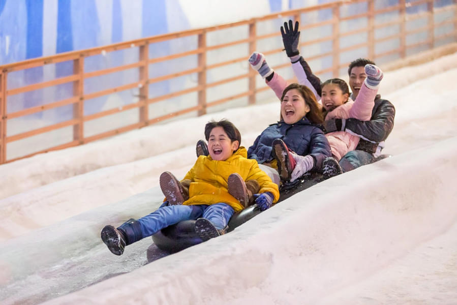 Enjoy on a chilling 60-meter snow slide with family