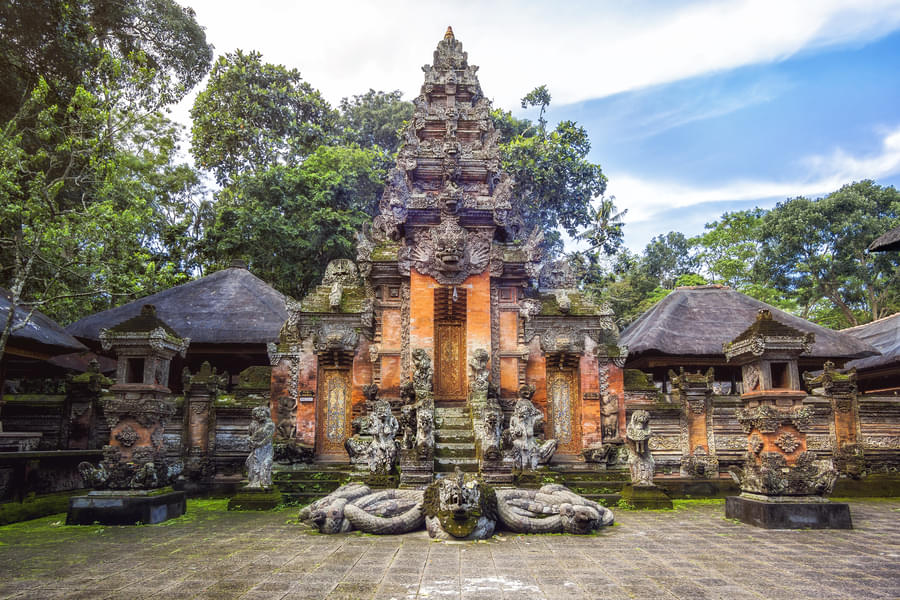 Visit temples within the Monkey Forest 