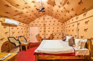 Relax in comfortable tents for a luxurious desert camping experience