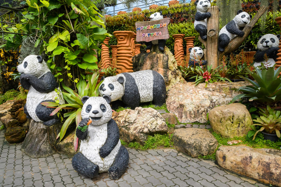 Marvel at Cute Panda Mascot Statues in the garden