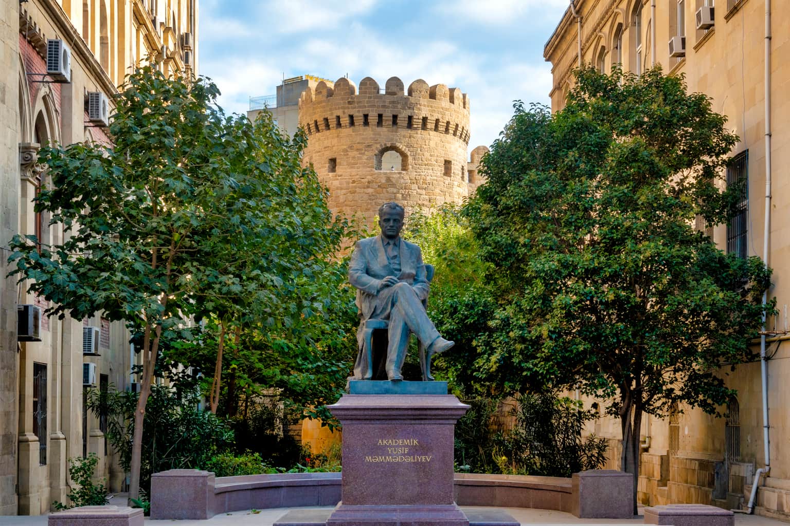 Statue of Sabir in front of the Old City walls in Baku, Azerbaijan.