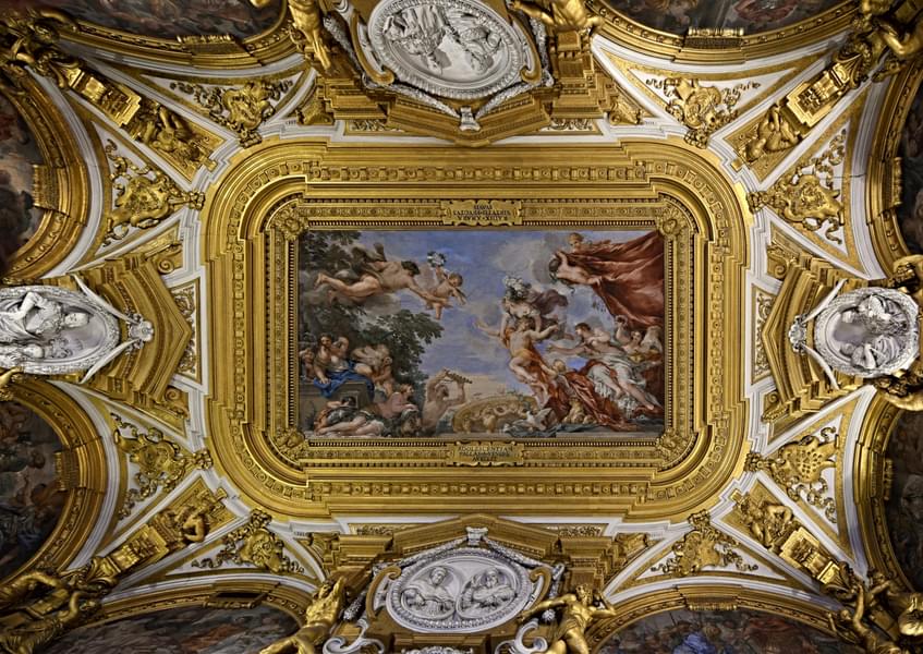 Admire the artworks on the ceiling.