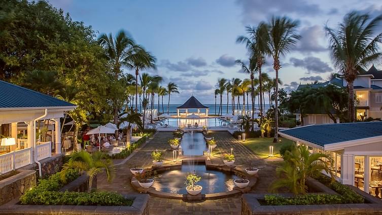 Shimmering waterfront of Heritage Le Telfair Golf and Wellness Resort, Mauritius