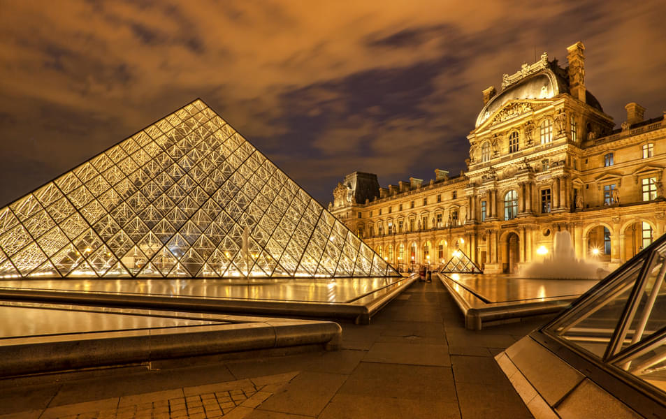 Pass by one of the most famous museums- Louvre Museum