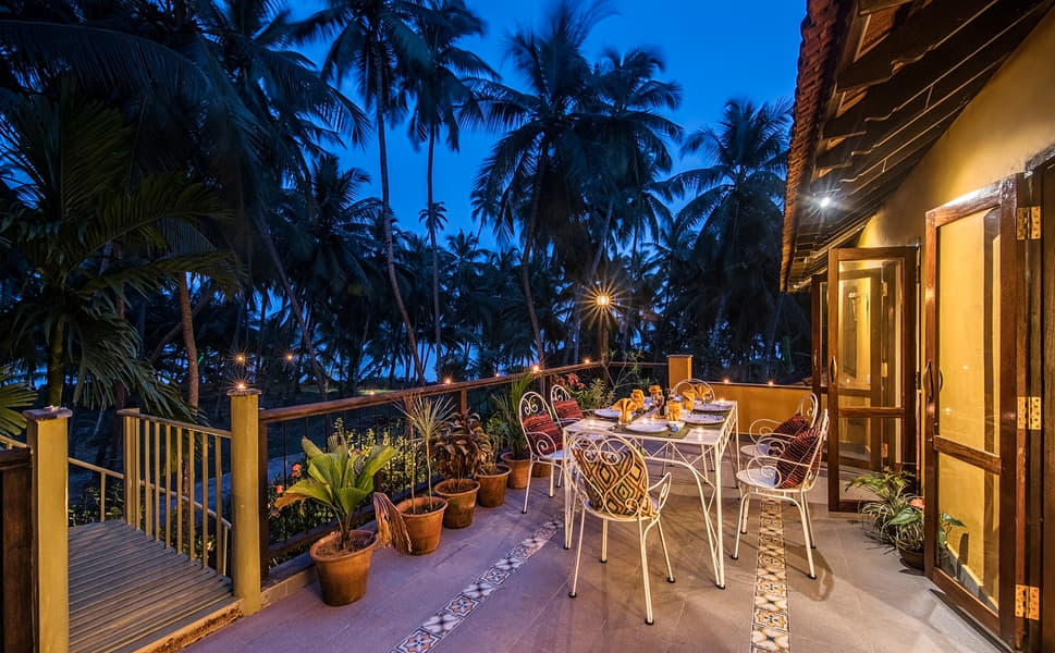 A Riverfront Villa Amidst Coconut Groves In Udupi Image