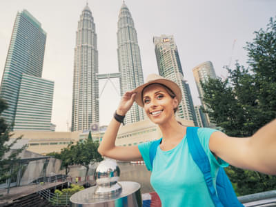 Capture a best selfie for Instagram with the iconic Twin Towers in the background