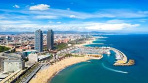 Helicopter Flight over Coastline of Barcelona
