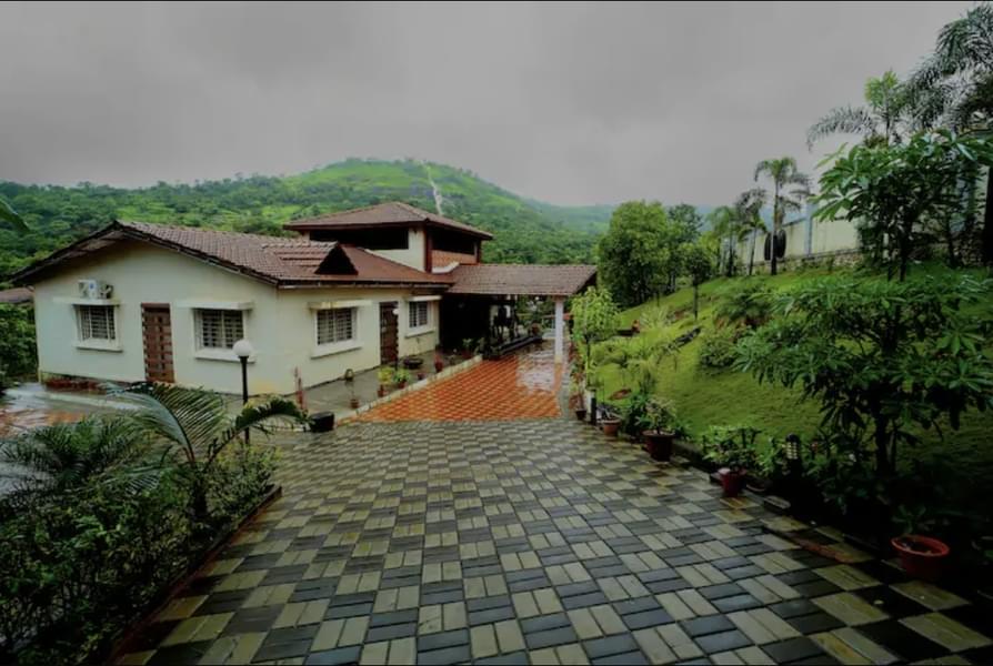 A Lakeside Villa with Mountains Views in Lonavala Image