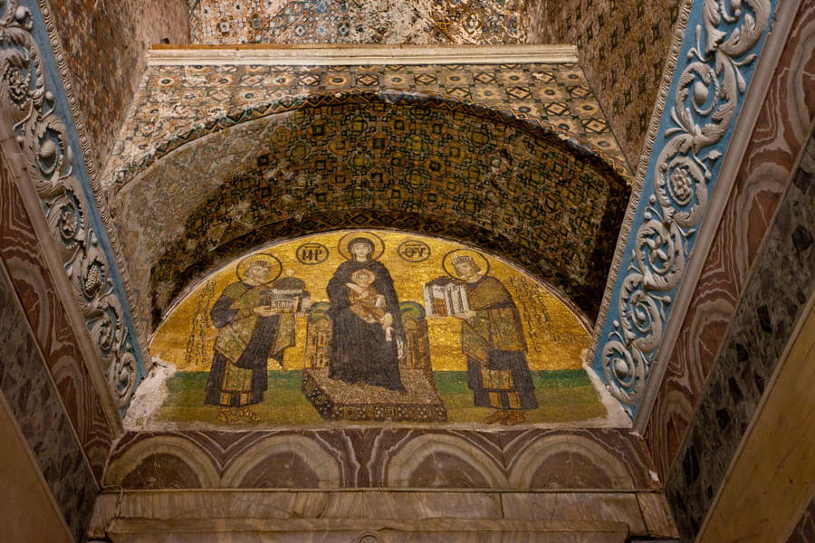Marvel the great mosaics adorning the interior walls
