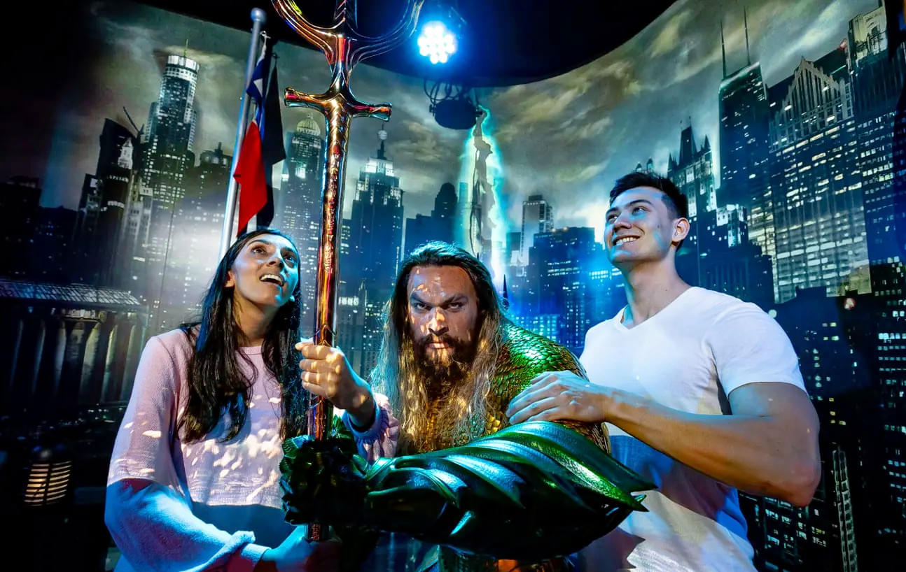 Pose with Aquaman's wax statue at Madame Tussauds Museum in Sydney