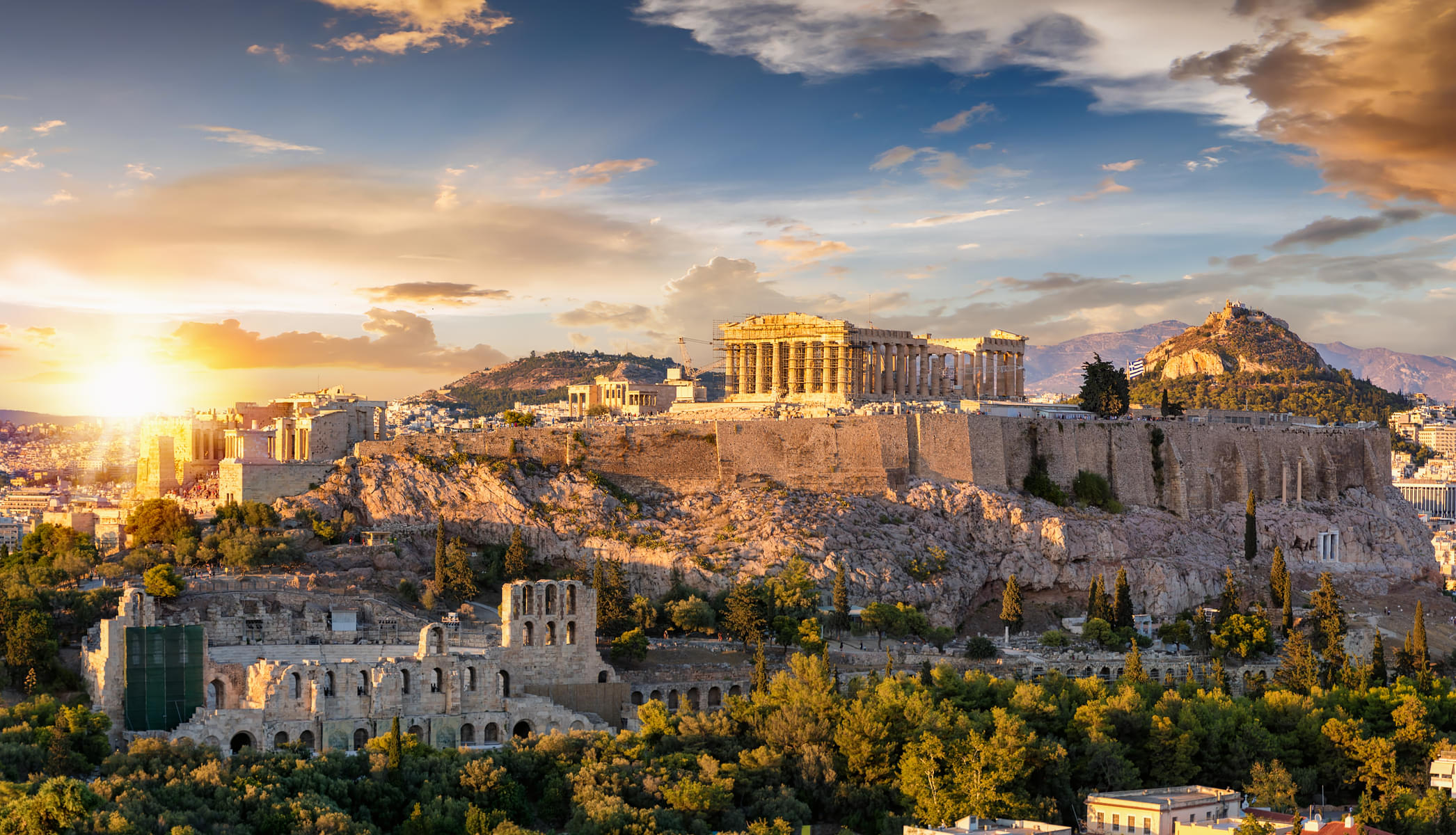 Enjoy the breathtaking views of Athens from the rocky landscape